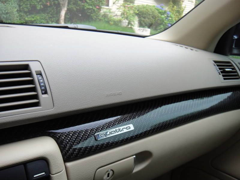Beige/Tan interior w/ Carbon Fiber Trim